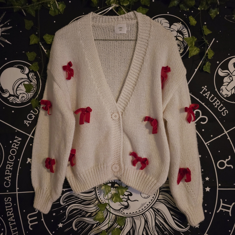 Chic White Sweater with Red Accents